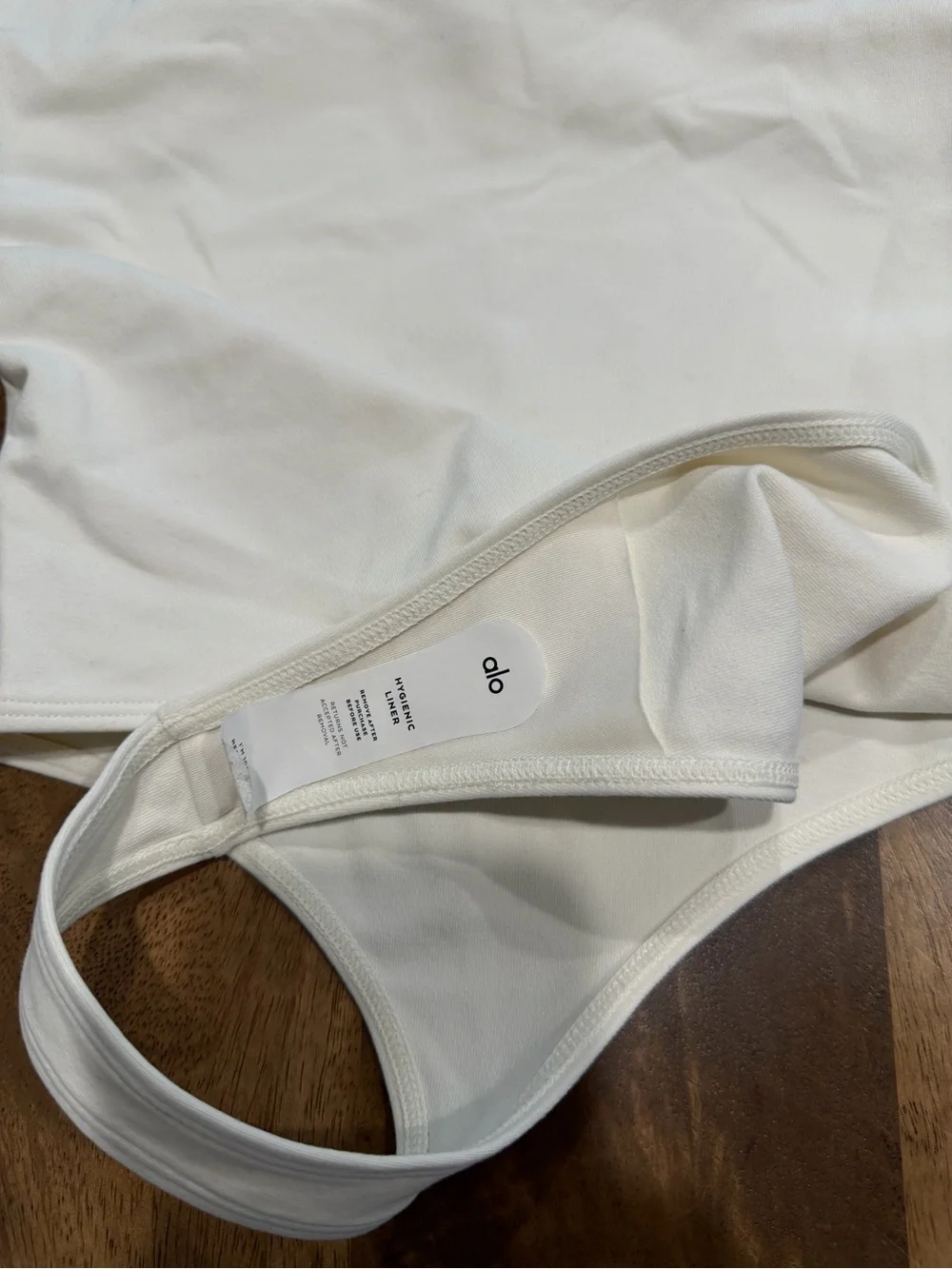 ALO Yoga White Racerback One-Piece Bodysuit